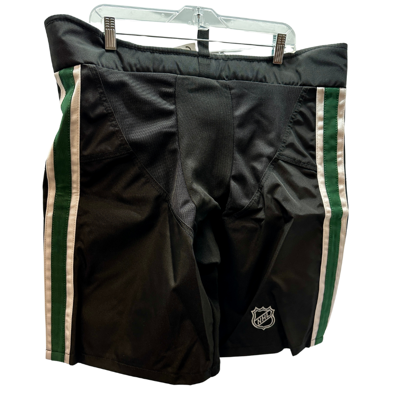 Warrior NHL Pro Return Dallas Stars Pant Shells back hanging from clothes hanger