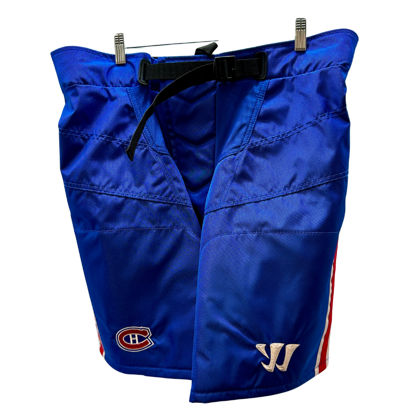Warrior NHL Pro Return Montreal Canadiens Pant Shells front hanging from clothes hanger