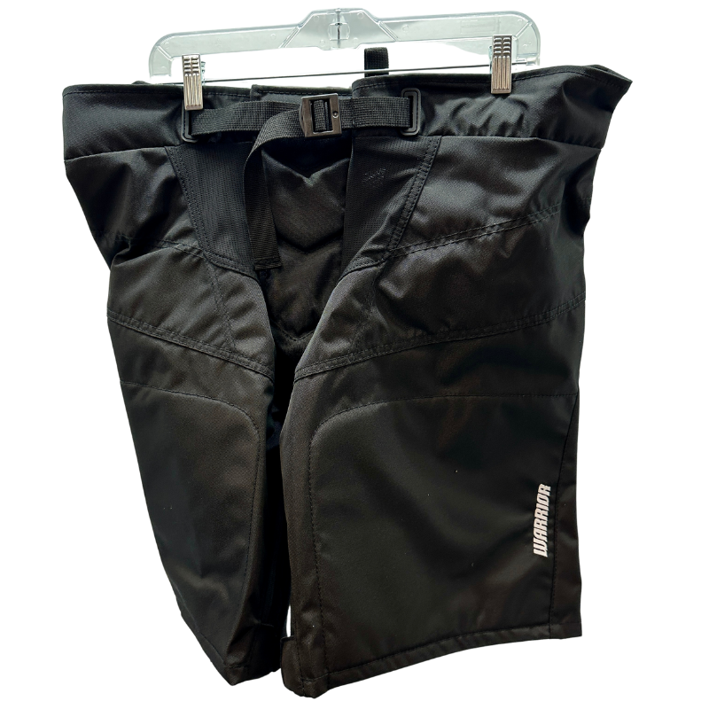 Warrior NHL Pro Return New Jersey Devils Pant Shells front hanging from a clothes hanger