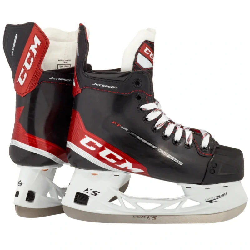 CCM Hockey Skates CCM Jetspeed FT485 Junior Black Red back of one skate and the side facing right of the other