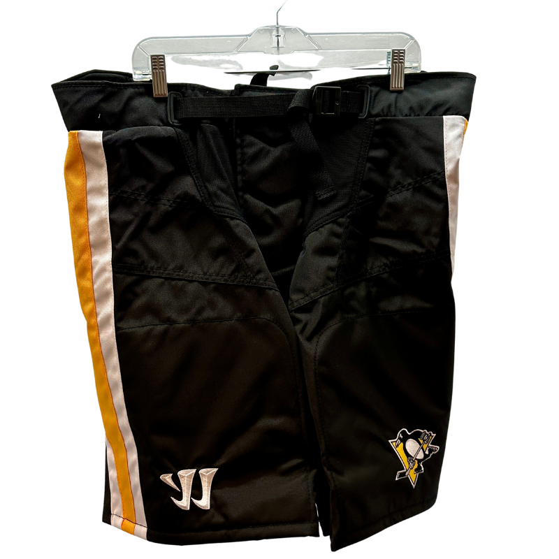 Warrior NHL Pro Return Pittsburgh Penguins Third Pant Shells front hanging from clothes hanger