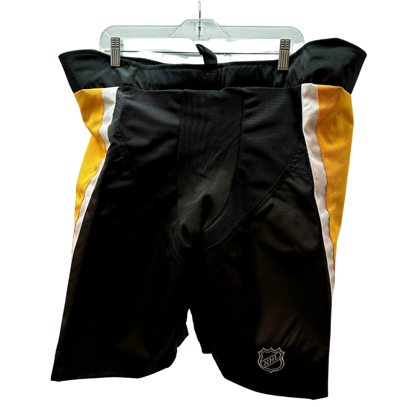Warrior NHL Pro Return Pittsburgh Penguins Third Pant Shells back hanging from clothes hanger